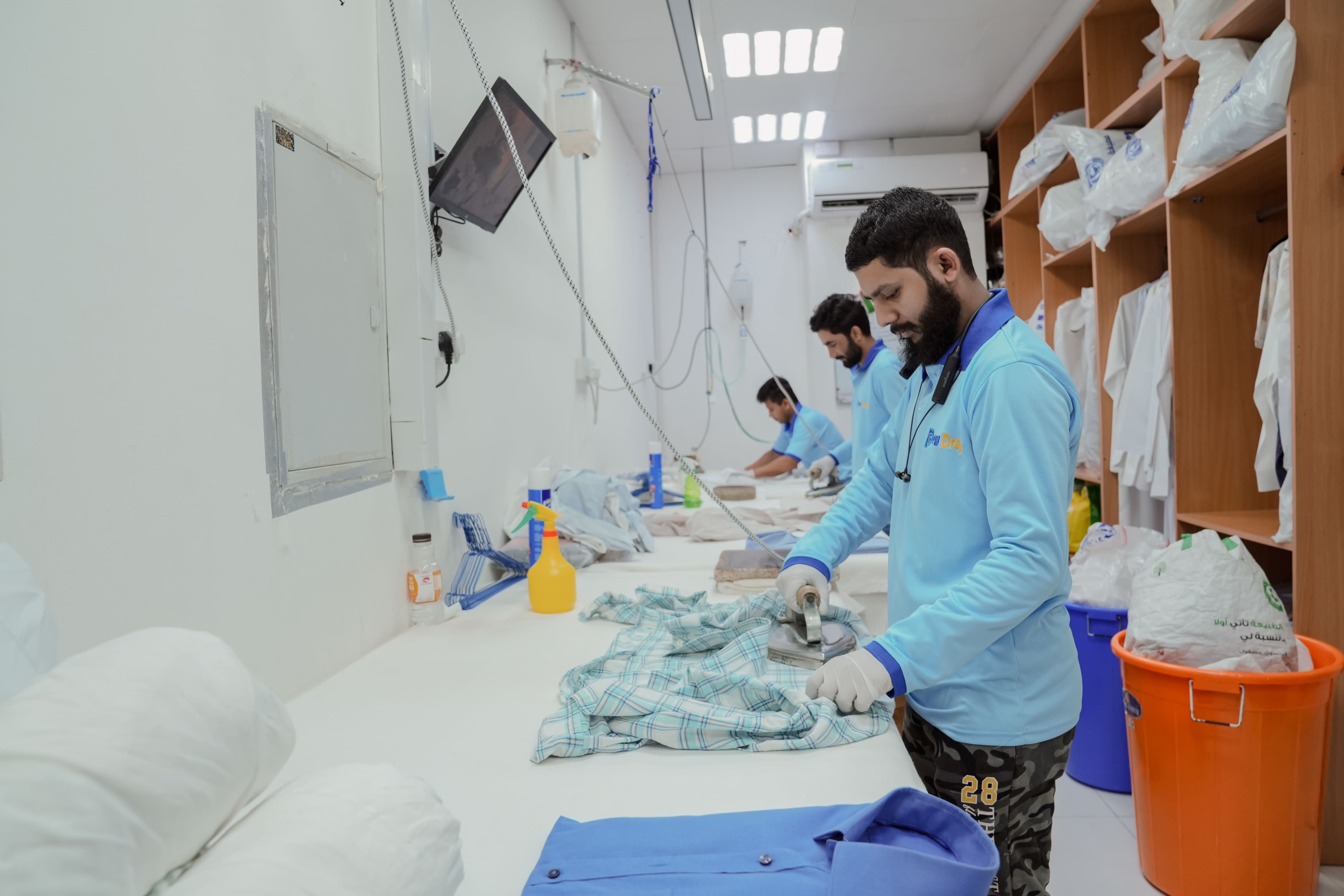 Clean, modern laundry with blue accents